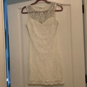 White lace dress with jewels